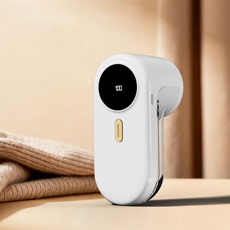 H42f0869ea8374f6d975165bca3544415c Cordless Reusable Electric Lint Remover - Image 1